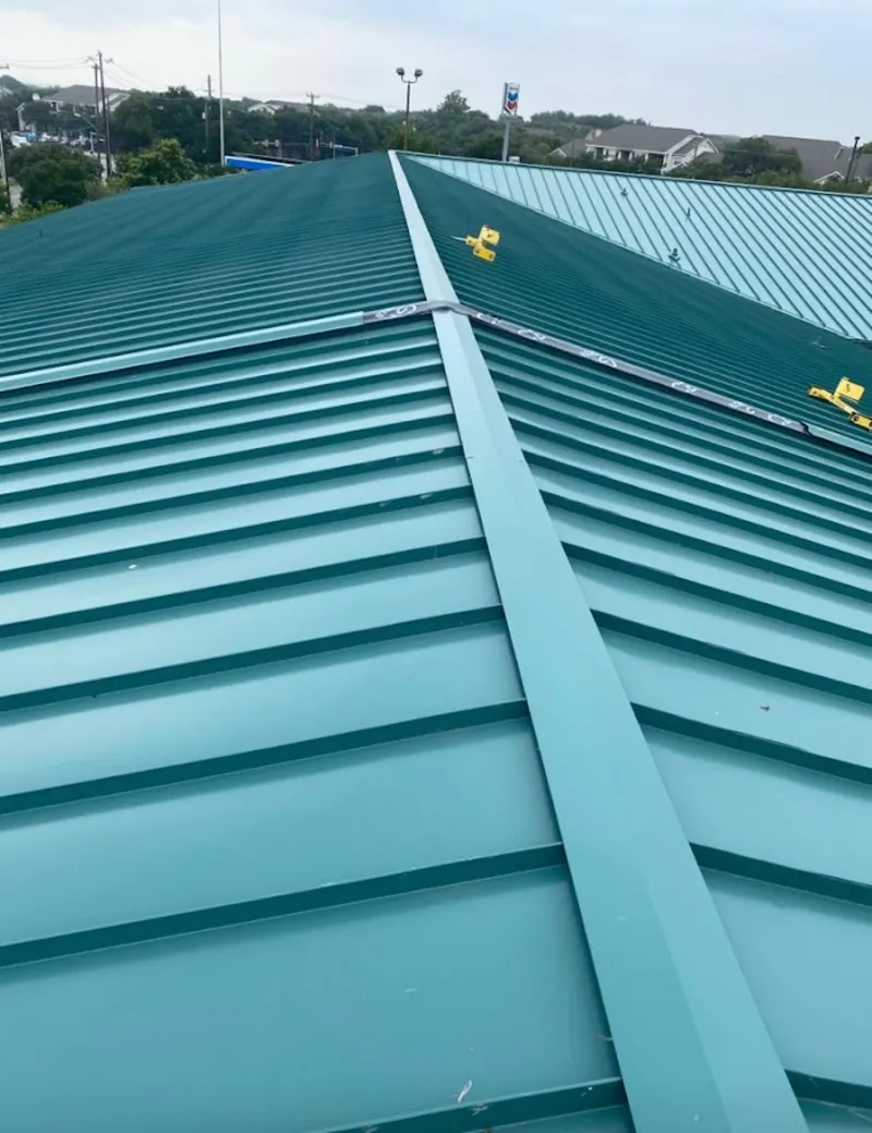 Green commercial metal roof ridge and valley for Metal Roof Repair in Fort Wayne