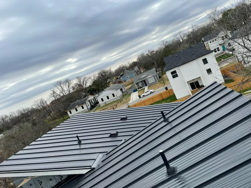 Standing seam metal roof panels with vents for Skylight Repair in Fort Wayne